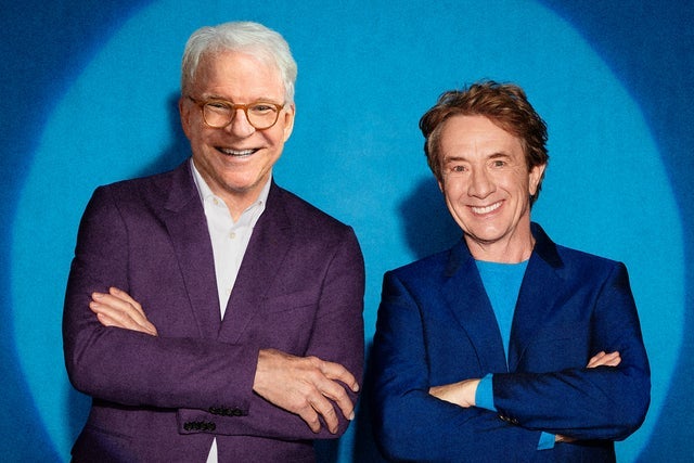 Steve Martin & Martin Short in suits standing side by side